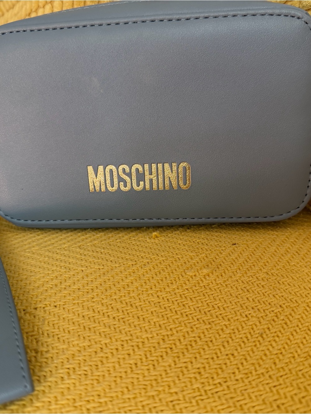 Moschino Light Blue Cosmetic Pouch with Gold Logo